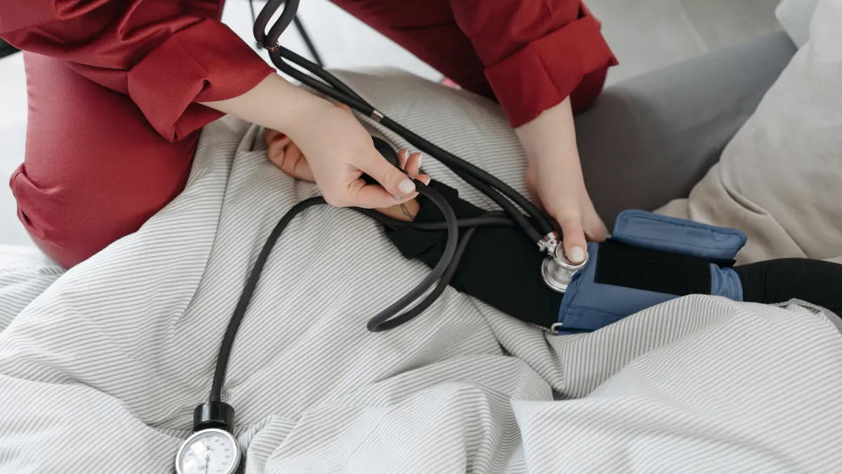 Close-up of blood pressure being checked at home